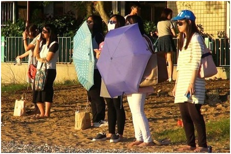 Người Hồng Kông thi nhau ngắm mặt trời để giảm cân