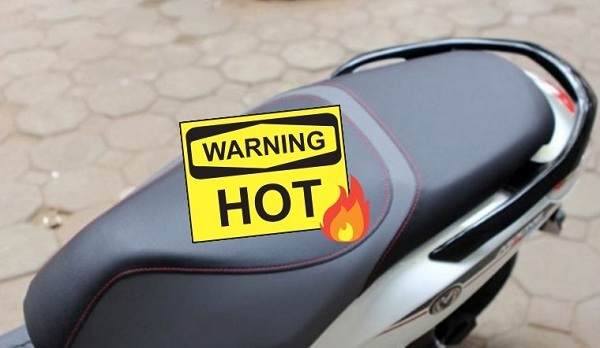 Cẩn trọng ngồi yên xe máy ngày hè nắng nóng